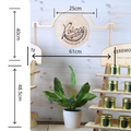 Wooden shelf with Raizes branding, plant, and containers, with measurements indicated.