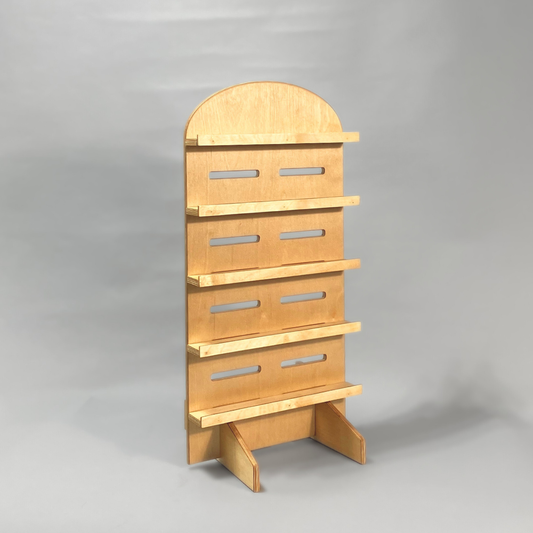 Wooden jewellery display rack on a gray background