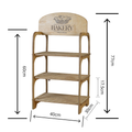 Wooden stand for markets with three shelves that shows a bakery logo